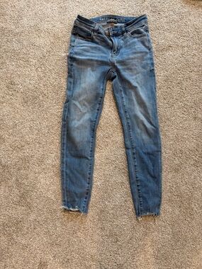American Eagle Outfitters Light Blue Skinny Jeans with Raw Hem